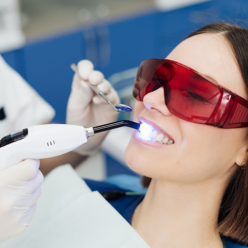 Woman getting dental bonding