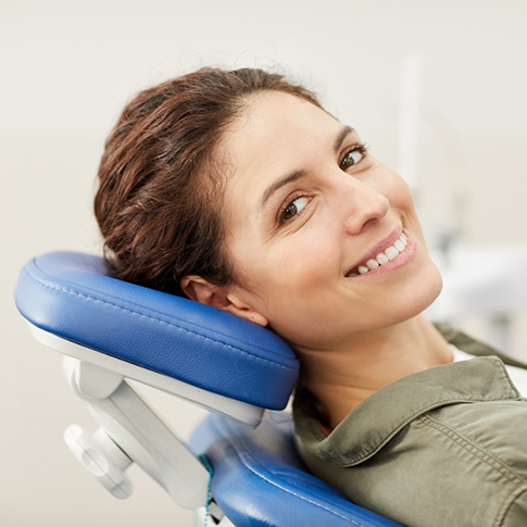 Woman smiling in the dental chair